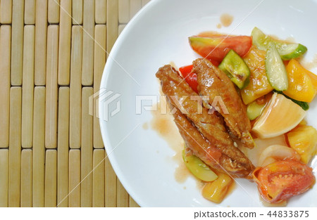 deep fried fish in sweet and sour gravy sauce deep fried fish in sweet and sour gravy sauce 44833875