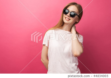Beautiful young blonde girl in glasses Beautiful young blonde girl in glasses 44834003