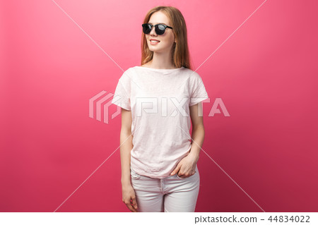Beautiful young blonde girl in glasses 44834022