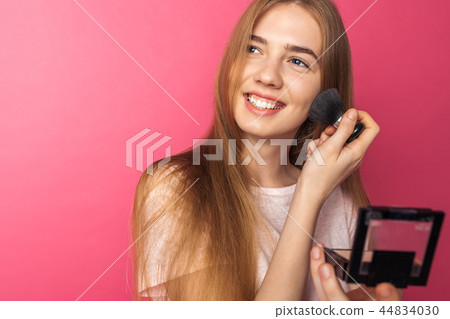 Young beautiful woman enjoys brush Young beautiful woman enjoys brush 44834030