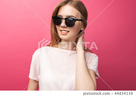 Beautiful young blonde girl in glasses Beautiful young blonde girl in glasses 44834139