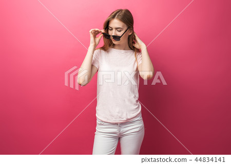 Beautiful young blonde girl in glasses  44834141