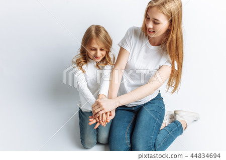 Mom and little daughter looking at each other 44834694