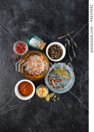 Black food background with spices. 44834942