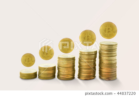 stacks of gold coins income with bitcoin. 44837220