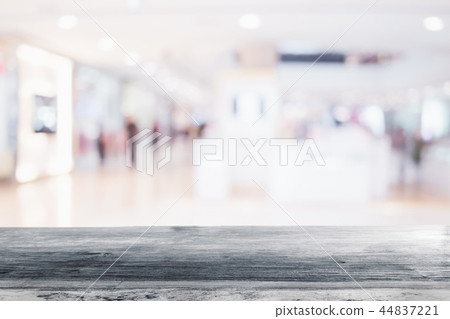 wood table with shopping mall store blurred 44837221