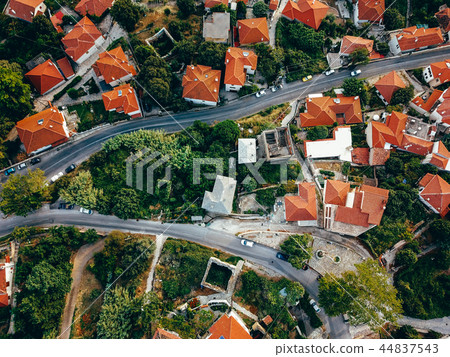 Old european city with red tiled roofs of houses 44837543
