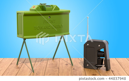 Anti-personnel mine on the wooden table 44837948