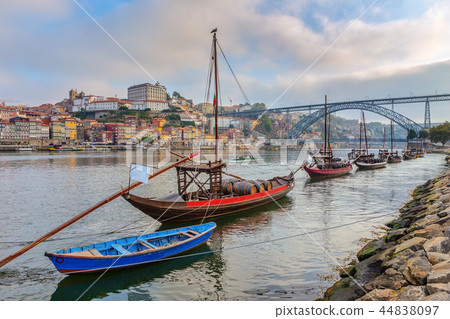 Traditional boats with barrels of wine, on the Douro River in the Portuguese city of Porto. 44838097