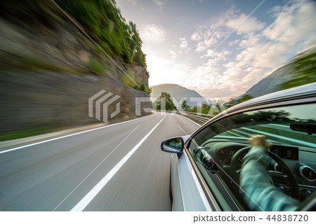 Car in motion blur driving in the Mountains 44838720