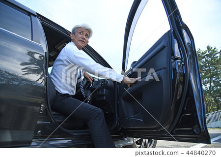 Romance gray man getting off car Romance gray man getting off car 44840270