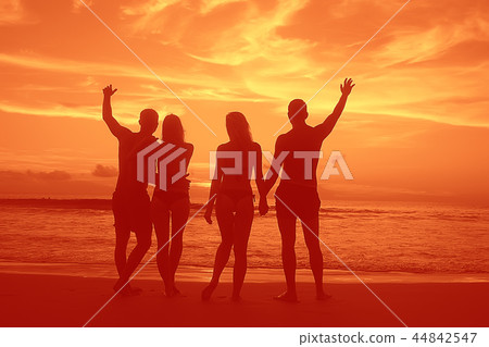 silhouette in love sunset sea / newlyweds in honeymoon at sea, vacation luck summer sea beach, silhouette couple at sunset 44842547