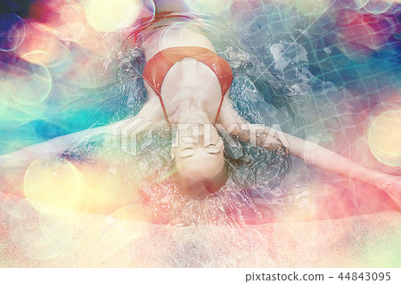 pool girl hotel / summer vacation at the hotel, beautiful young adult girl resting and enjoying the splashes at the pool in the hotel pool girl hotel / summer vacation at the hotel, beautiful young adult girl resting and enjoying the splashes at the pool in the hotel 44843095