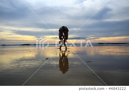 meditation and yoga on the beach / summer vacation concept health beauty, summer vacation yoga classes on the sea shore 44843222