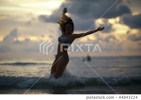 happy girl beach sea / girl in summer on the beach freedom wind wet hair, concept of summer vacation young beautiful girl happy girl beach sea / girl in summer on the beach freedom wind wet hair, concept of summer vacation young beautiful girl 44843224