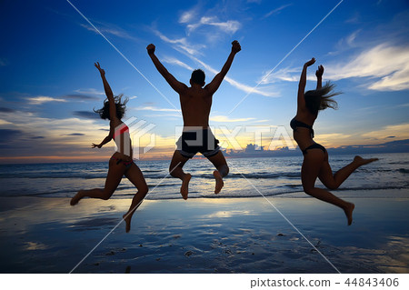 girl is having fun and jumping on beach freedom / concept freedom and summer beach, sporty graceful girl is jumping and having fun beach girl is having fun and jumping on beach freedom / concept freedom and summer beach, sporty graceful girl is jumping and having fun beach 44843406