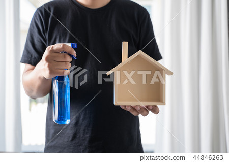 Close up vacuum cleaner Man cleaning at home Close up vacuum cleaner Man cleaning at home 44846263