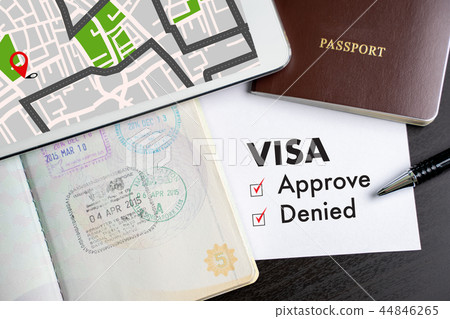 Visa and passport to approved stamped on a  44846265