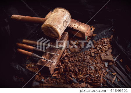 wooden hammer and chisels on sawdust wooden hammer and chisels on sawdust 44846401