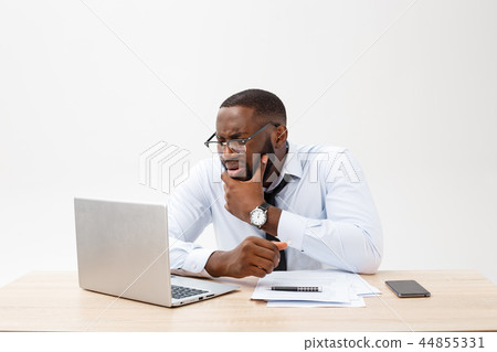 Disappointed African businessman is dazed and confused by a mistake in official documents. He feels 44855331
