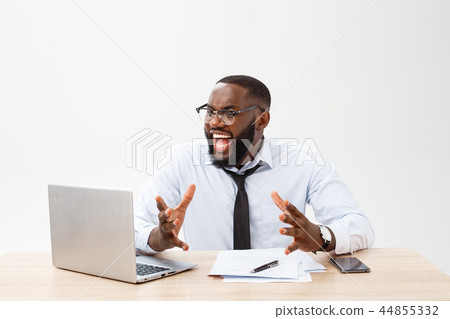 Disappointed African businessman is dazed and confused by a mistake in official documents. He feels Disappointed African businessman is dazed and confused by a mistake in official documents. He feels 44855332