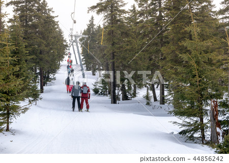 Skiers on T-bar ski lift in Szklarska Poreba 44856242