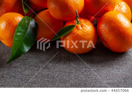 Fresh juicy clementine mandarins, winter fruits. Fresh juicy clementine mandarins, winter fruits. 44857066