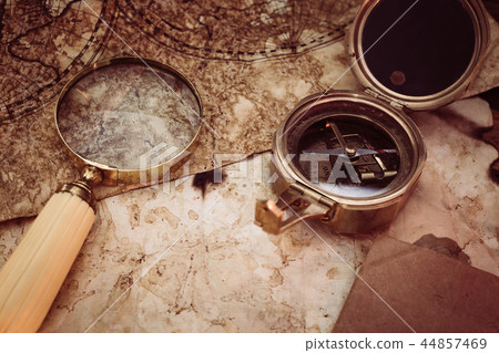 Old maps with marine equipment like compass 44857469