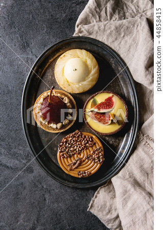 Variety of sweet tartlets 44858415