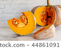 sliced raw pumpkin on marblel table background. 44861091