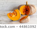 sliced raw pumpkin on marblel table background. 44861092