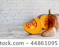 sliced raw pumpkin on marblel table background. 44861095