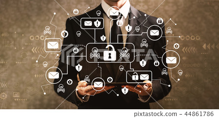 Email virus and scam theme with businessman holding a tablet com Email virus and scam theme with businessman holding a tablet com 44861786