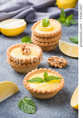 Homemade lemon curd in tartlets with fresh lemon  44861907