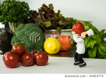 Doll and cherry tomatoes Doll and cherry tomatoes 44864778