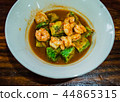 Sour soup spicy with shrimp and fired egg. 44865315