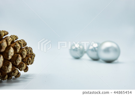 Silver Christmas balls with pine cone. 44865454