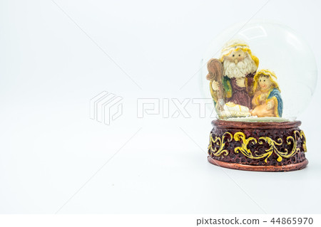 Christian nativity scene snow globe. Copy space. Christian nativity scene snow globe. Copy space. 44865970
