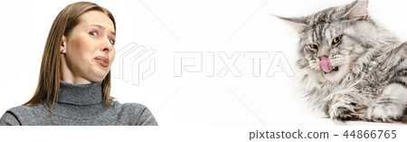 Woman with her cat over white background Woman with her cat over white background 44866765