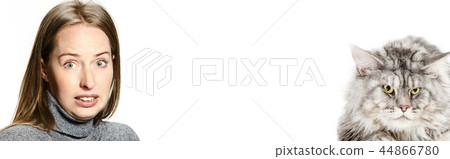 Woman with her cat over white background Woman with her cat over white background 44866780