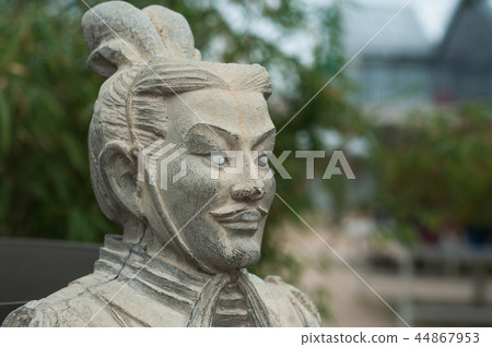 closeup of stoned statue in japanese garden closeup of stoned statue in japanese garden 44867953