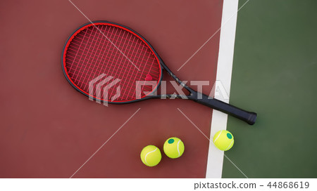 Tennis racket with balls on background 44868619