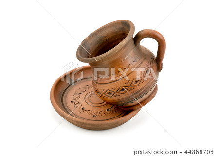 Ceramic cup and saucer isolated on white Ceramic cup and saucer isolated on white 44868703