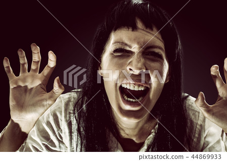 Halloween scary brunette woman with long hair 44869933