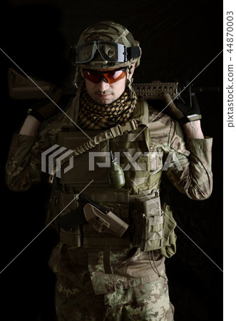 Macro portrait of a military man sniper Macro portrait of a military man sniper 44870003