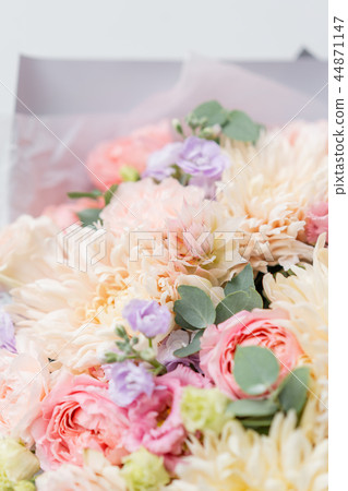 Beautiful spring bouquet in glass vase. Arrangement with various flowers. The concept of a flower 44871147