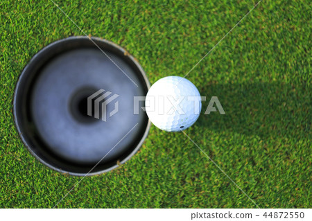 Cup and golf ball 44872550