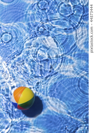 Summer holiday concept photo. vacation items and beach accessories in swimming pool or yellow background. 022 44873444