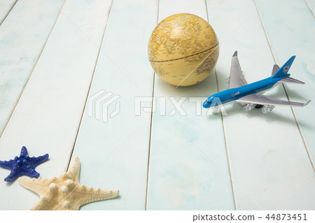 Summer holiday concept photo. vacation items and beach accessories in swimming pool or yellow background. 060 44873451