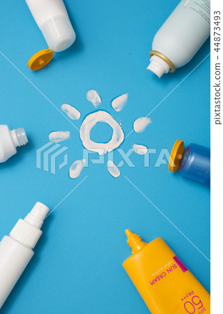Summer holiday concept photo. vacation items and beach accessories in swimming pool or yellow background. 040 44873493